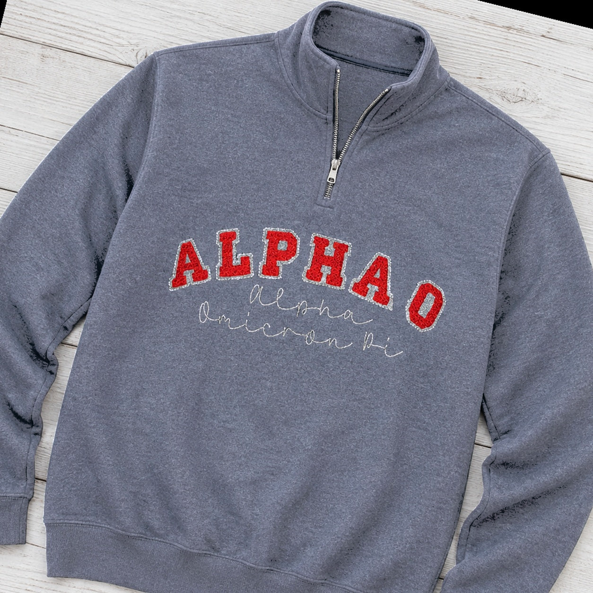 Arched Varsity Lettering Quarter-Zip. Shown in: Gildan • Heather Dark Navy.