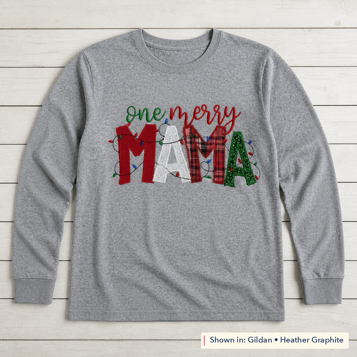 One Merry Mama Christmas Lights Long-Sleeve Tee. Shown in: Gildan • Heather Graphite.