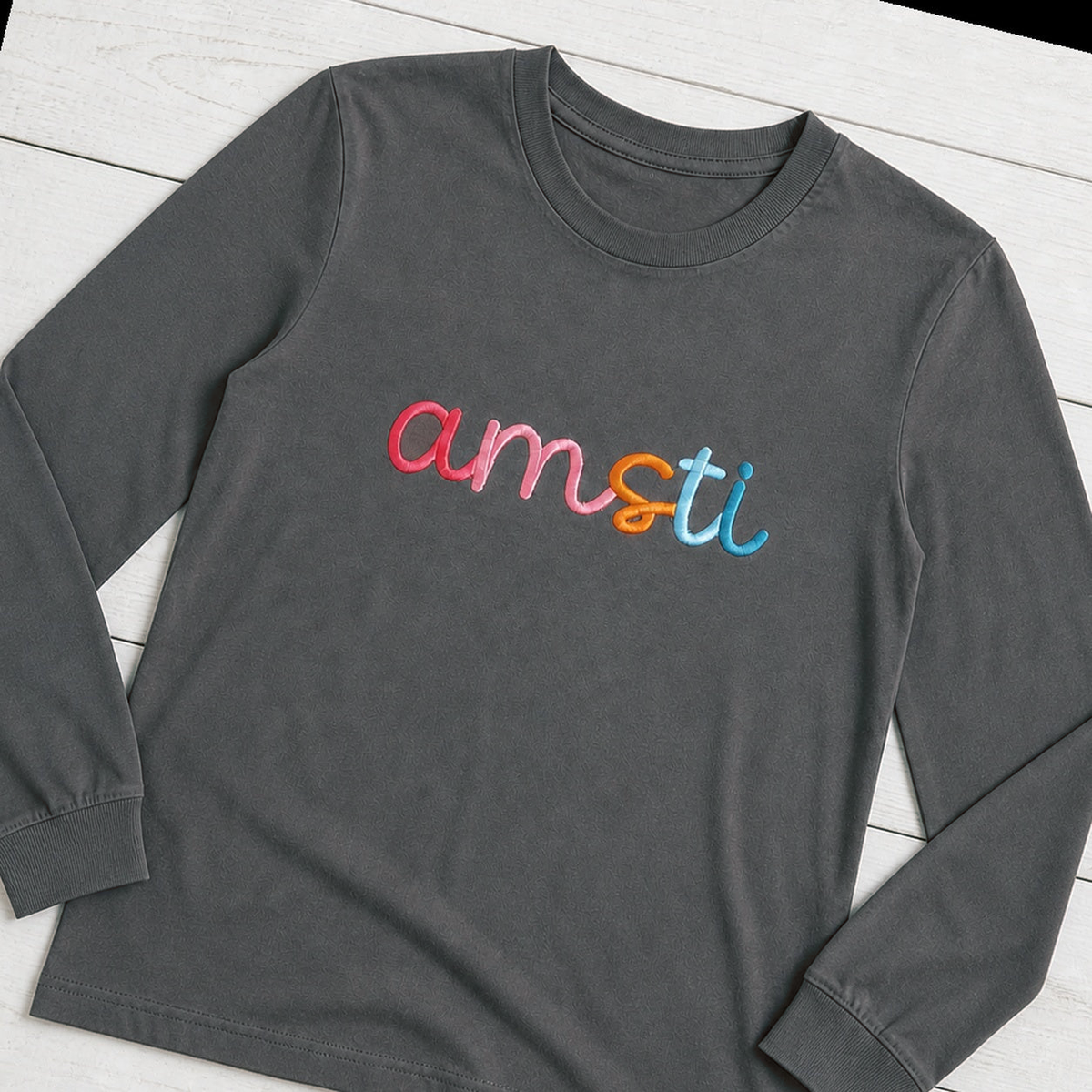 Rainbow 3D Puff Script Embroidery Long-Sleeve Tee. Shown in: Comfort Colors • Pepper.