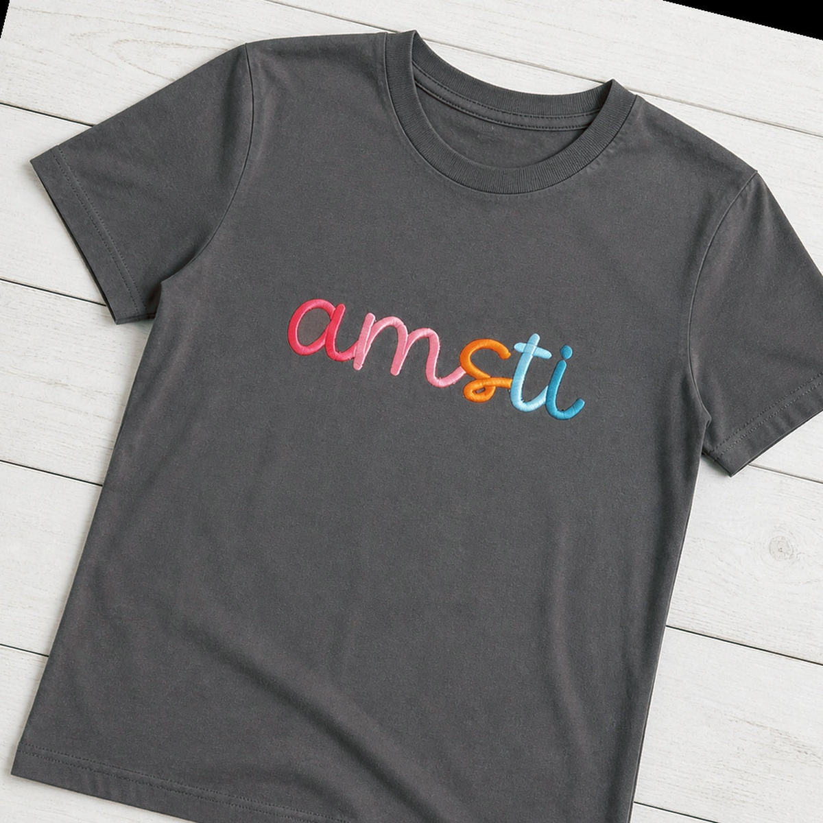 Rainbow 3D Puff Script Embroidery Tee. Shown in: Comfort Colors • Pepper.
