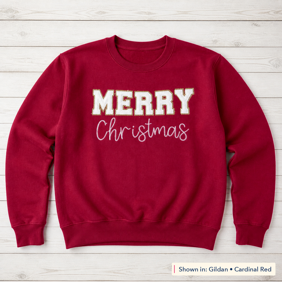 White & Gold Merry Christmas Sweatshirt. Shown in: Gildan • Cardinal Red.
