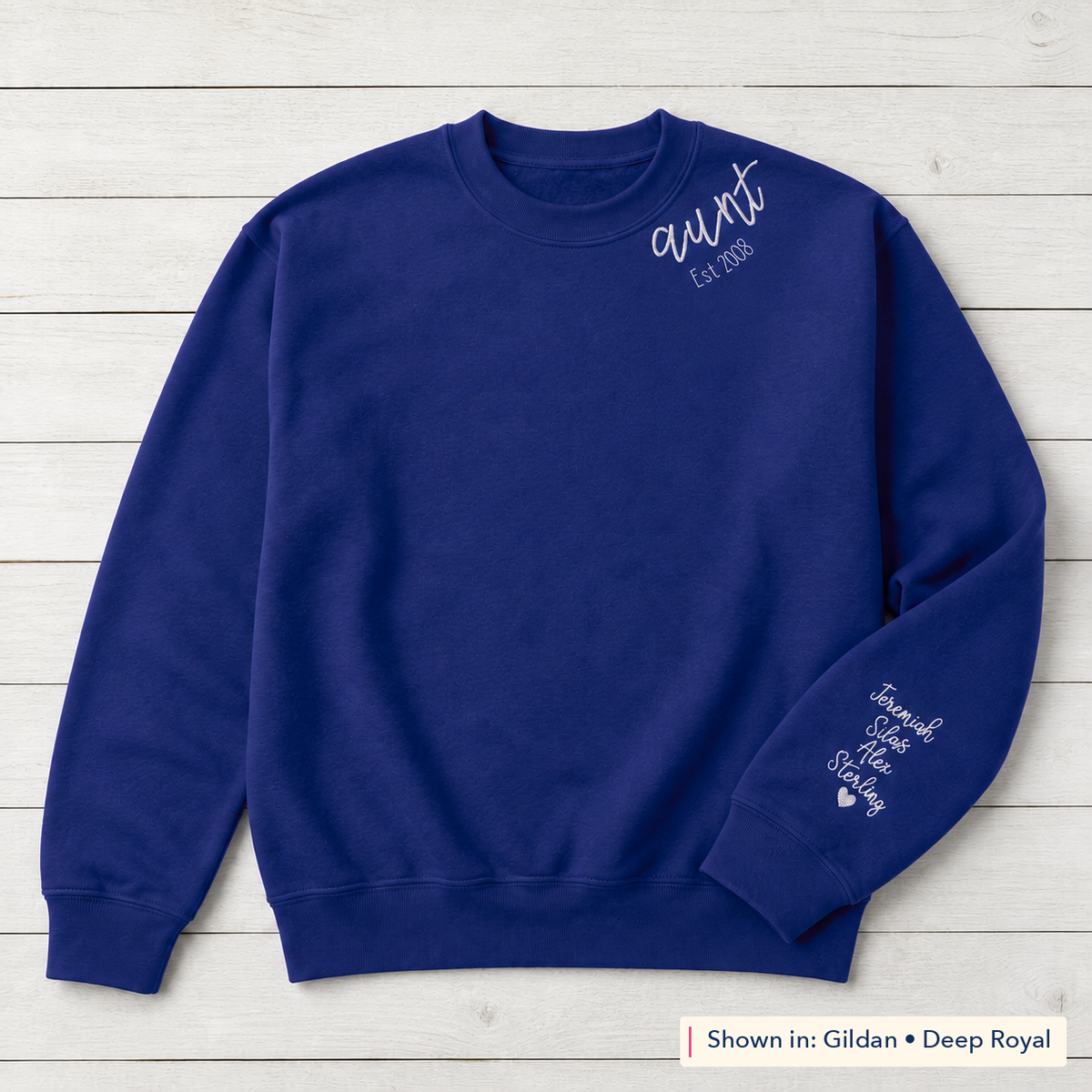 Established Script & Sleeve Names Sweatshirt. Curved-neck embroidery. Shown in: Gildan • Deep Royal.