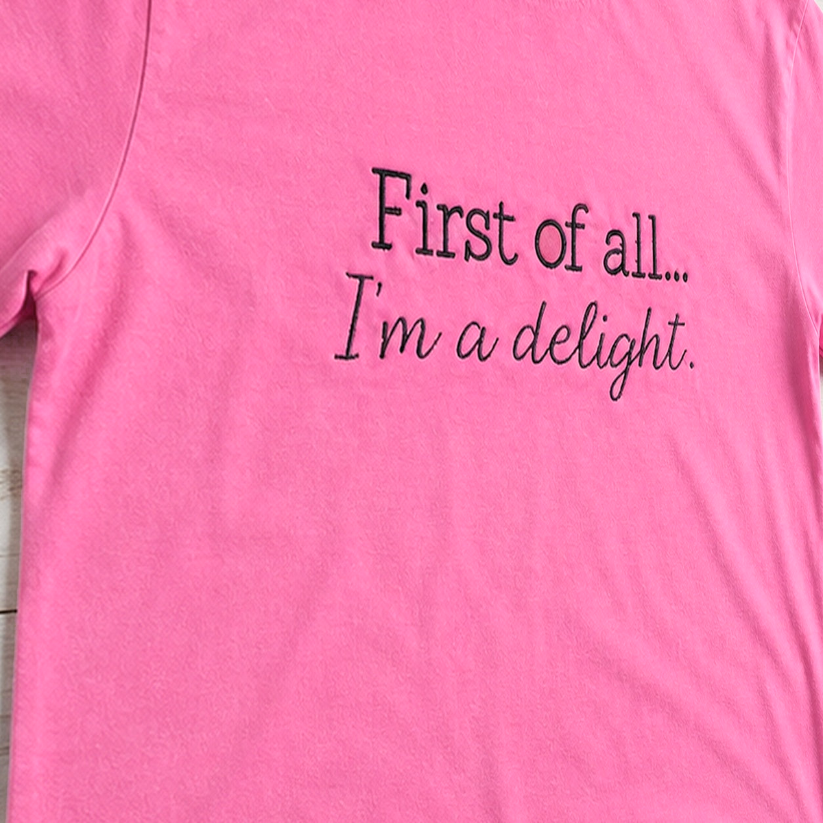First of All, I'm a Delight Tee. Shown in: Comfort Colors • Neon Pink.
