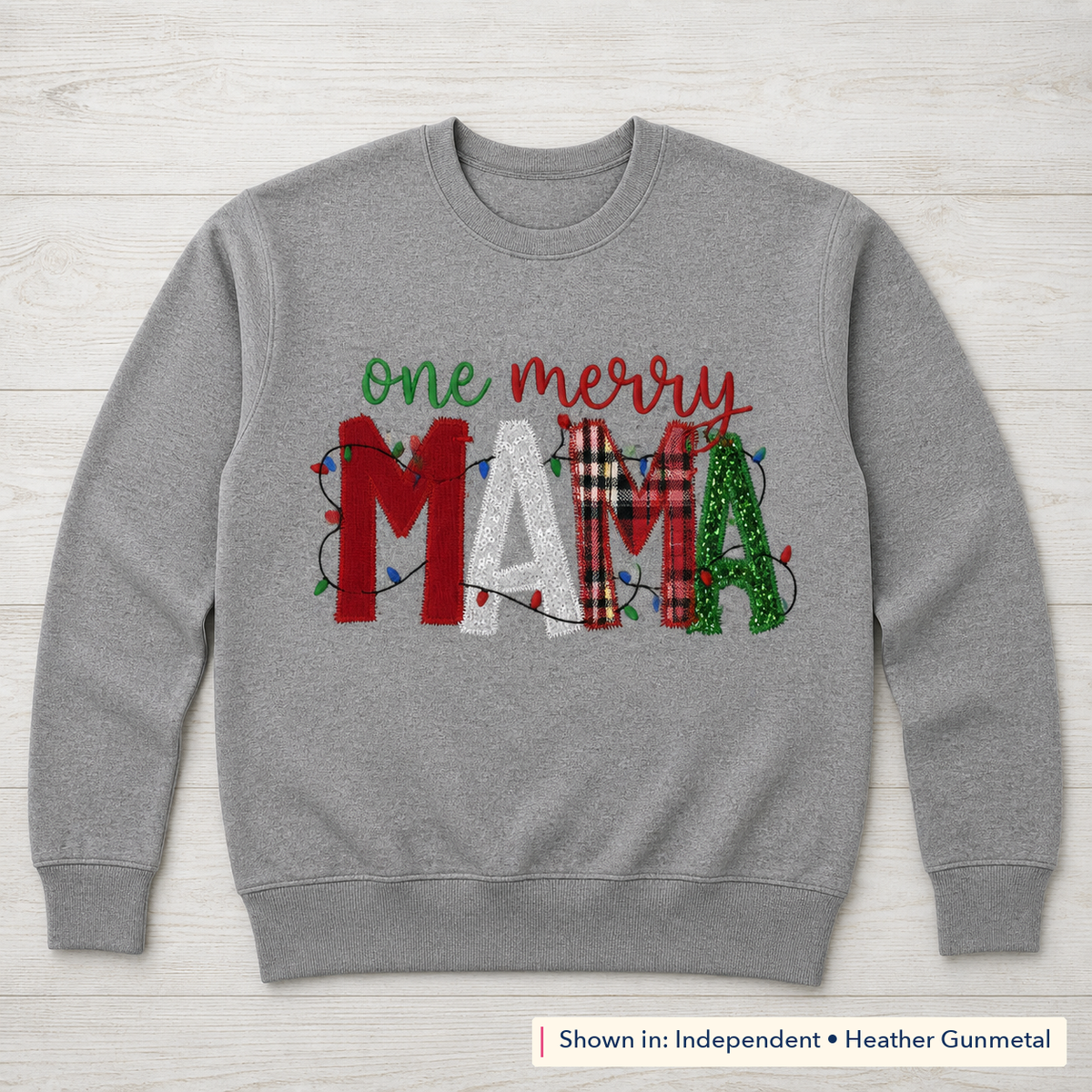 One Merry Mama Christmas Lights Sweatshirt. Shown in: Independent • Heather Gunmetal.