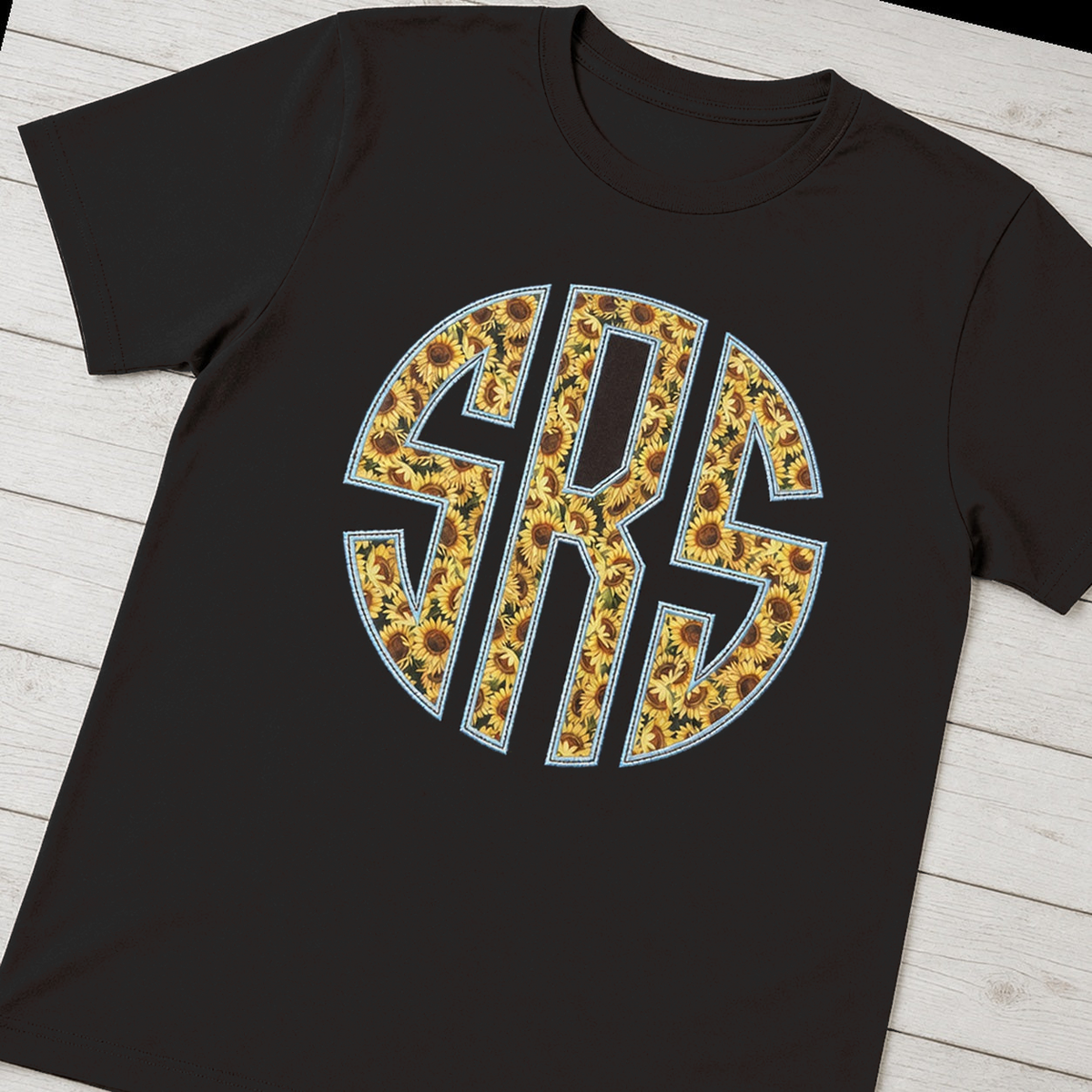 Sunflower Circle Monogram Tee. Shown in: Comfort Colors • Black.
