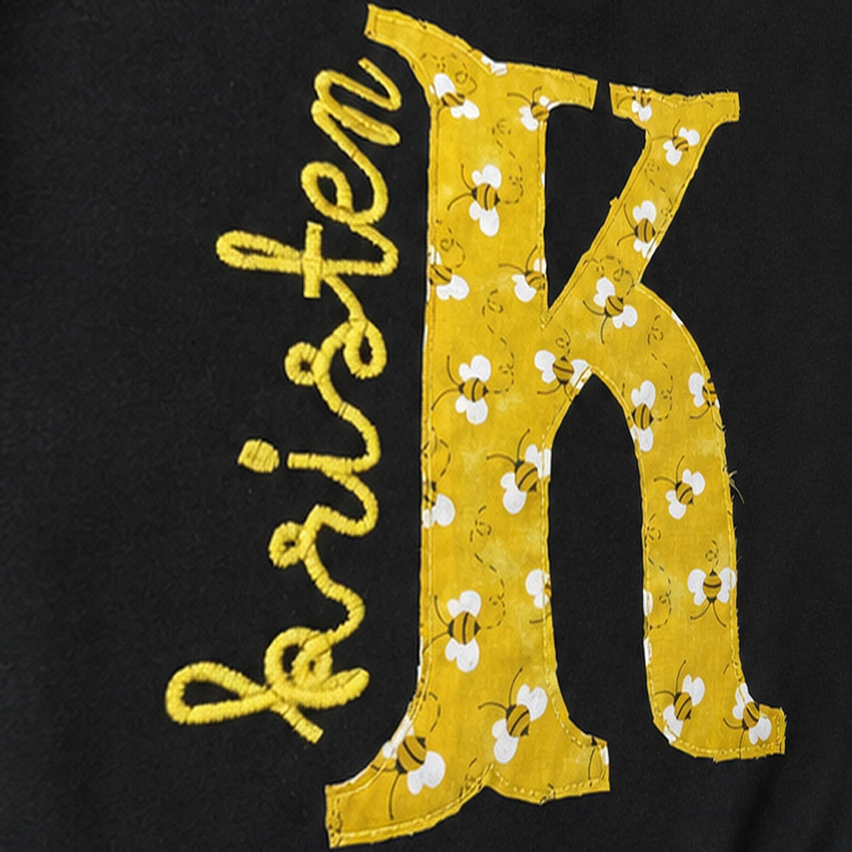 bee initial name quarter zip embroidery close-up