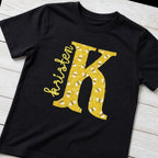 bee initial name short sleeve styled flat lay