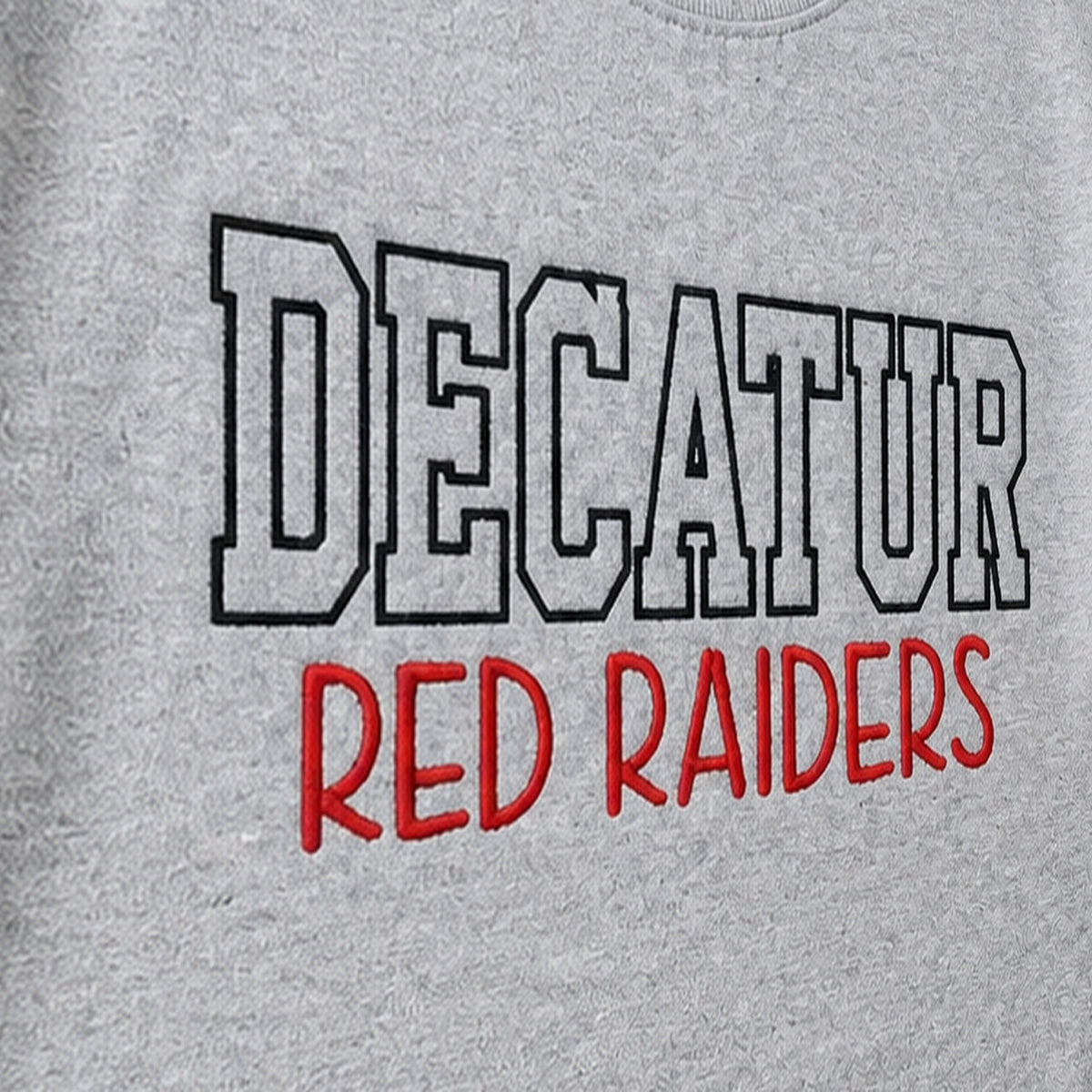 block outline team name crewneck embroidery close-up