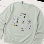 Custom botanical floral serif monogram crewneck sweatshirt folded flat lay