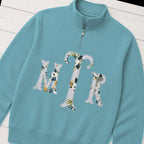 Custom botanical floral serif monogram quarter zip pullover folded flat lay