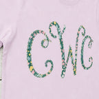 Close-up of the embroidered design on a floral vine monogram shirt