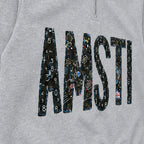 Close-up of the embroidered design on a custom chalkboard applique quarter zip pullover