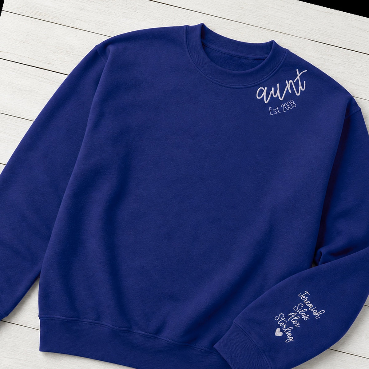 Aunt established sweatshirt with sleeve names folded flat lay