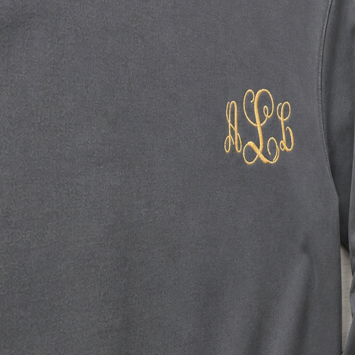 gold script pocket monogram crewneck embroidery close-up