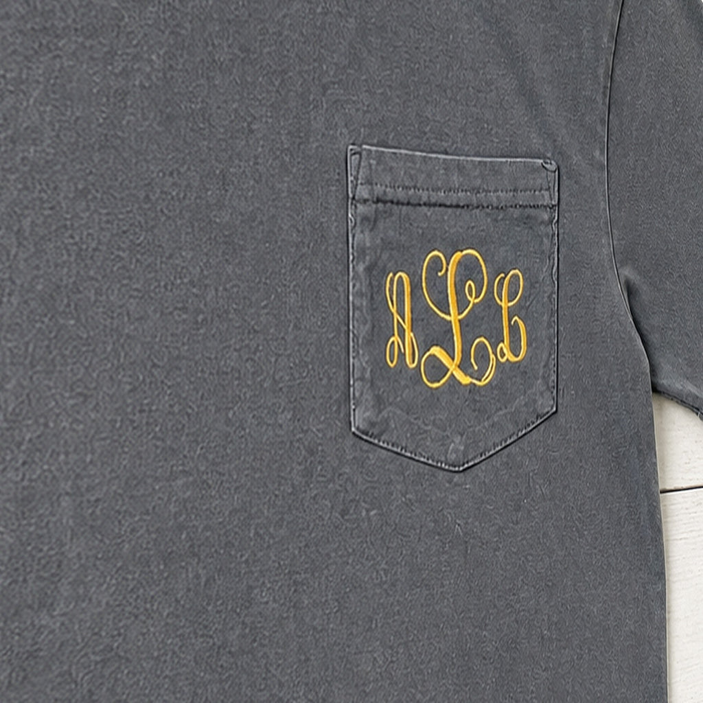 gold script pocket monogram short sleeve embroidery close-up