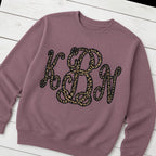 Custom leopard vine monogram crewneck sweatshirt folded flat lay