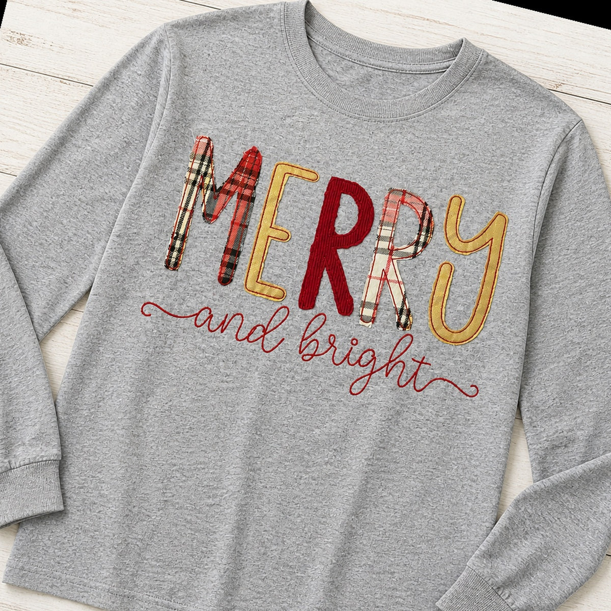 merry and bright long sleeve styled flat lay