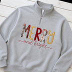 merry and bright quarter zip styled flat lay