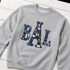 navy floral block monogram crewneck styled flat lay