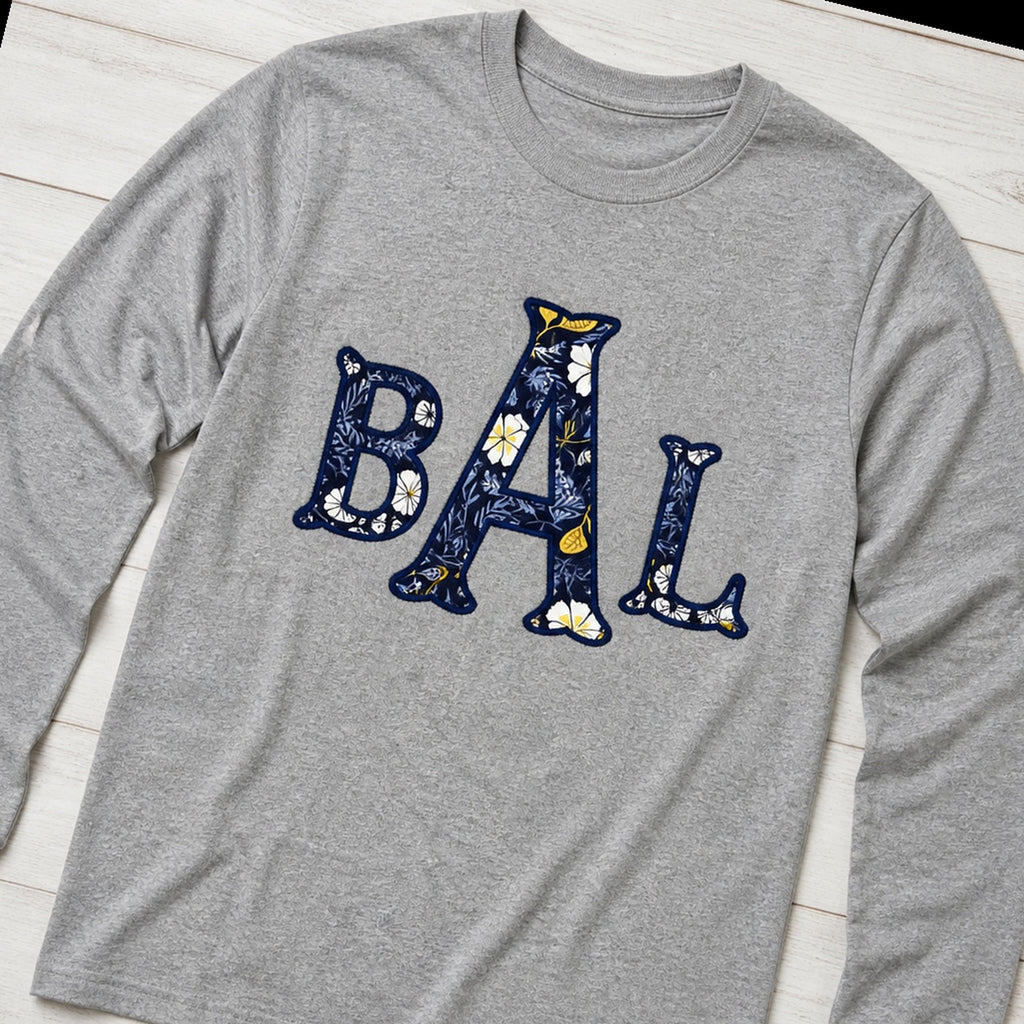 navy floral block monogram long sleeve styled flat lay