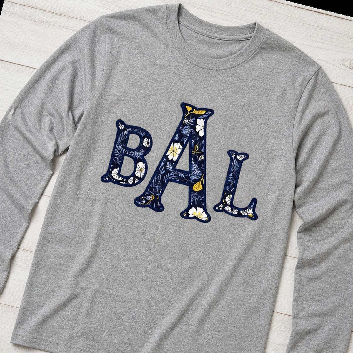navy floral block monogram long sleeve styled flat lay