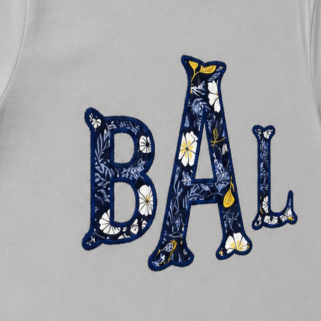 navy floral block monogram short sleeve embroidery close-up