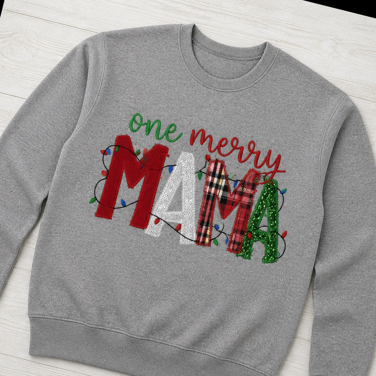 one merry mama crewneck styled flat lay