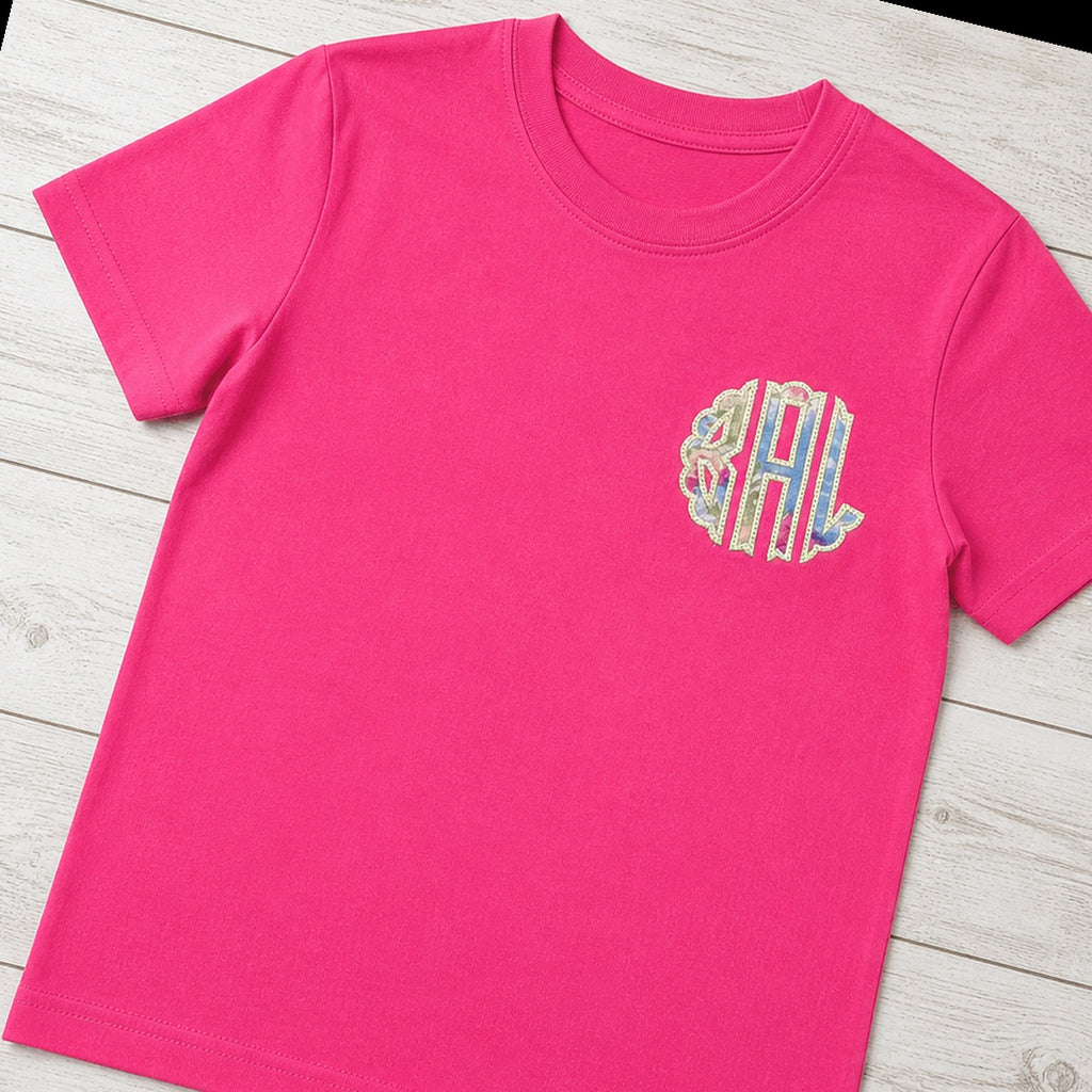 pastel scallop chest monogram short sleeve styled flat lay