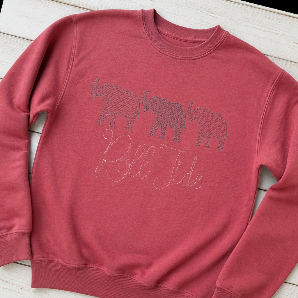 roll tide three elephants crewneck styled flat lay