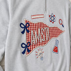 science gingham pennant quarter zip embroidery close-up
