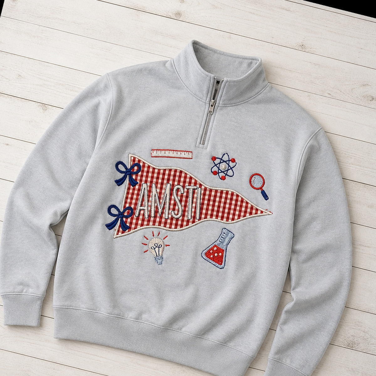 science gingham pennant quarter zip styled flat lay