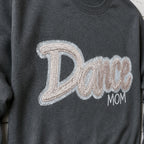 script glitter sequin crewneck embroidery close-up