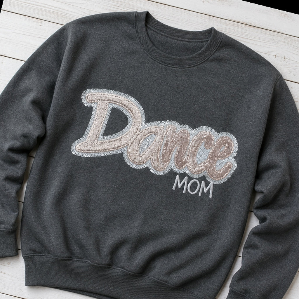 script glitter sequin crewneck styled flat lay