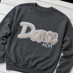 script glitter sequin crewneck styled flat lay