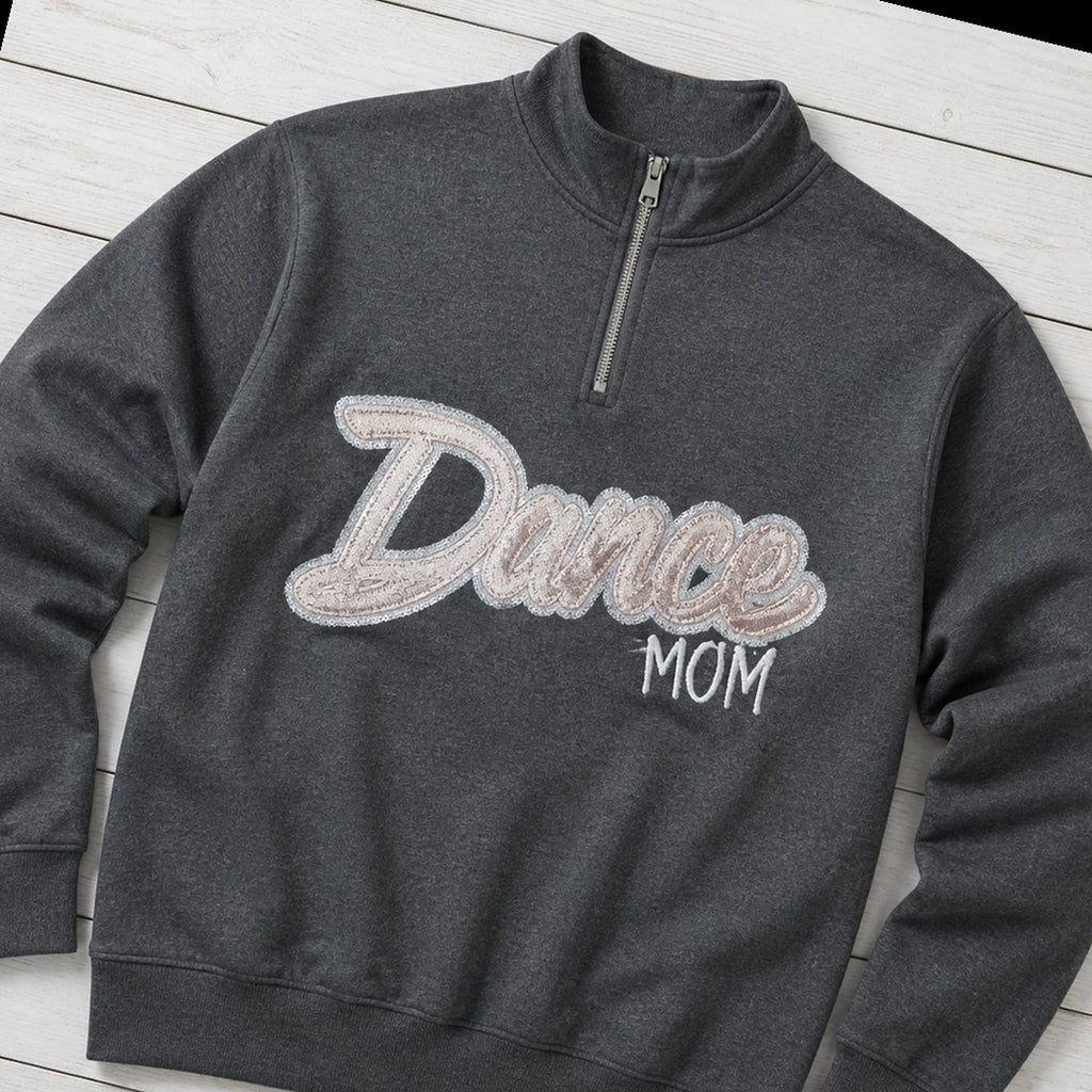 script glitter sequin quarter zip styled flat lay