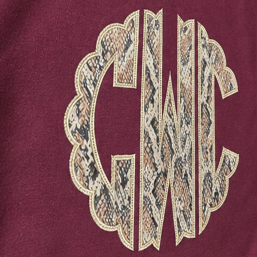 snakeskin scallop monogram crewneck embroidery close-up