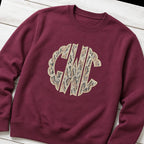 snakeskin scallop monogram crewneck styled flat lay