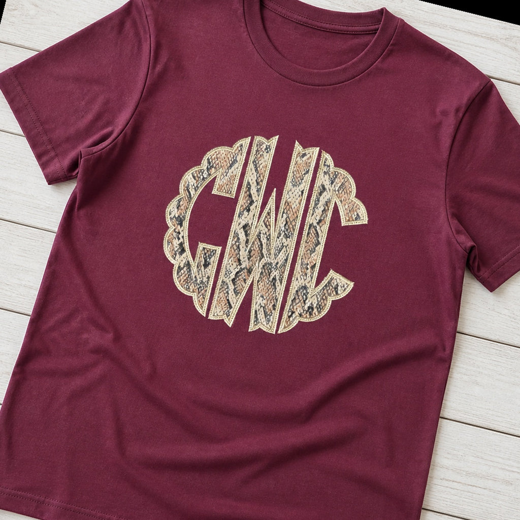 snakeskin scallop monogram short sleeve styled flat lay