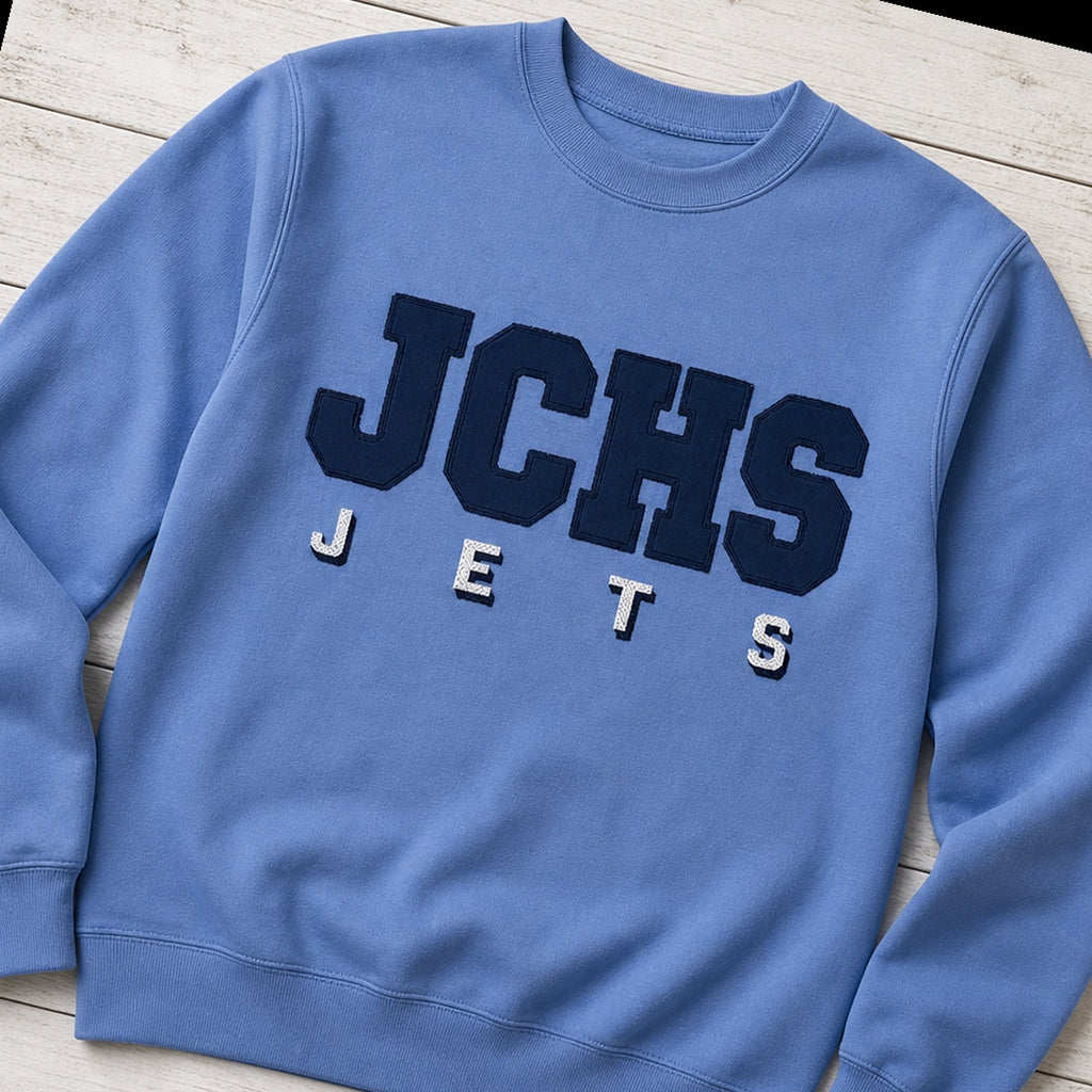 team lettering back name crewneck styled flat lay