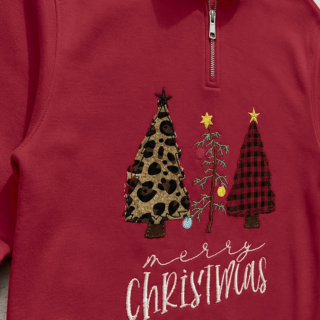 Close-up of the embroidered design on a custom patterned christmas trees quarter zip pullover