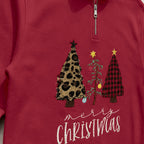 Close-up of the embroidered design on a custom patterned christmas trees quarter zip pullover