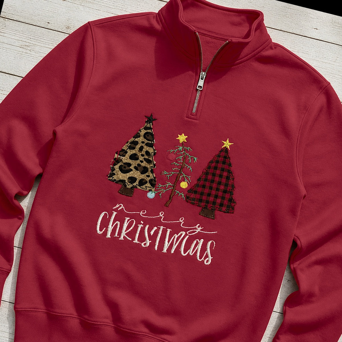 Custom patterned christmas trees quarter zip pullover folded flat lay