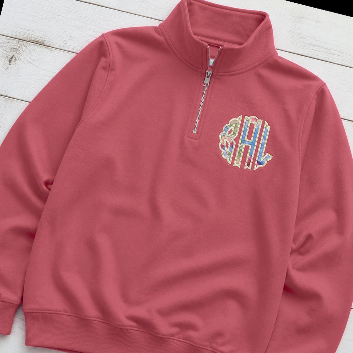 Custom pastel stripe chest monogram quarter zip pullover folded flat lay