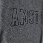 tonal block outline crewneck embroidery close-up