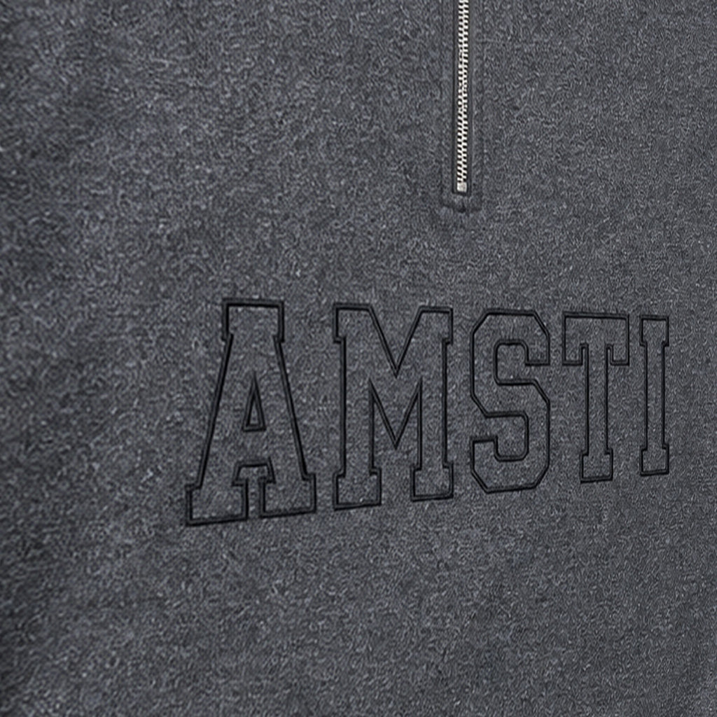 tonal block outline quarter zip embroidery close-up