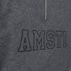 tonal block outline quarter zip embroidery close-up