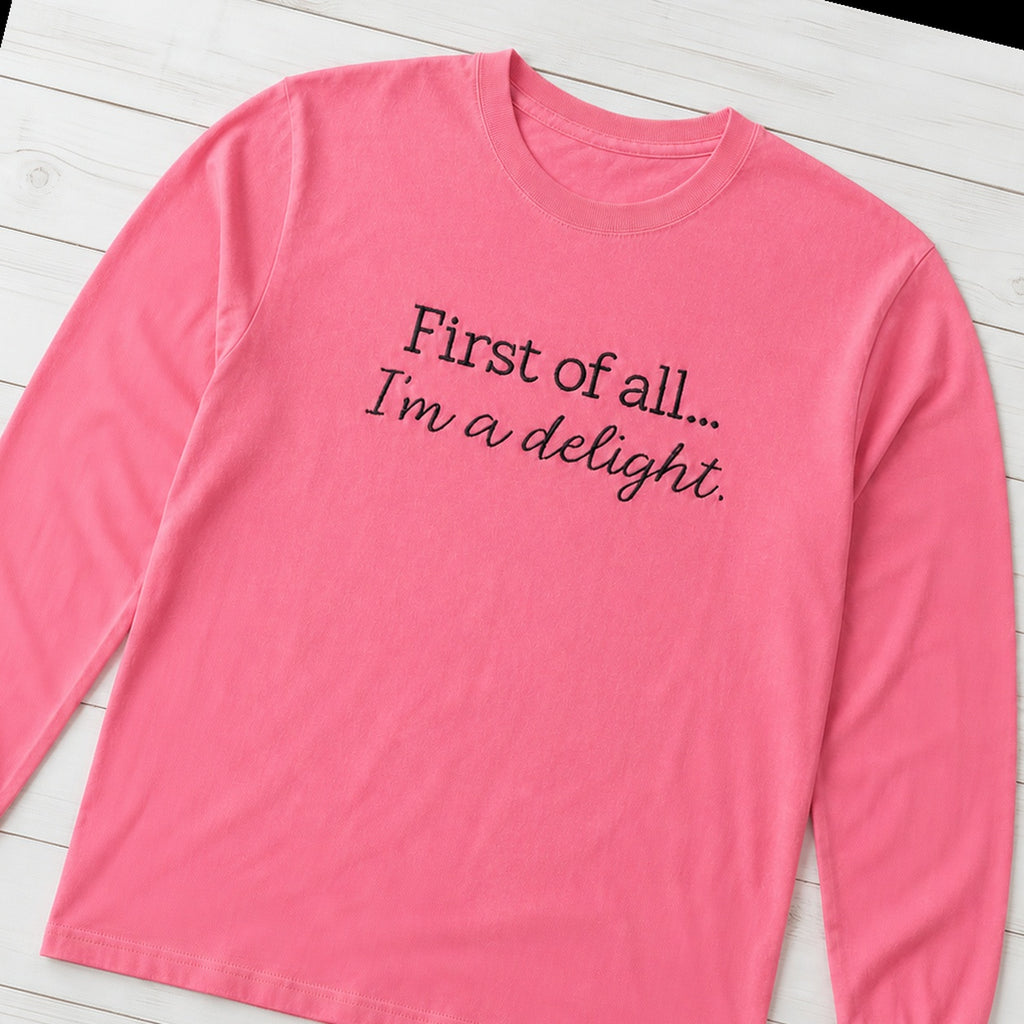 Custom two line embroidered saying long sleeve shirt folded flat lay