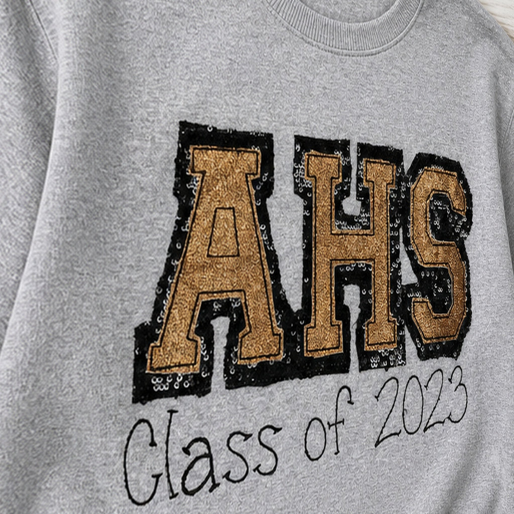 varsity graduation crewneck embroidery close-up