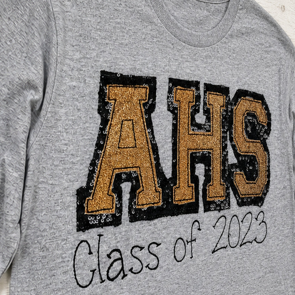 varsity graduation long sleeve embroidery close-up