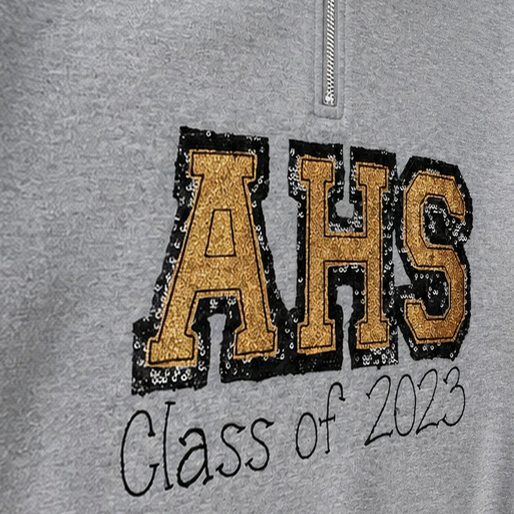 varsity graduation quarter zip embroidery close-up